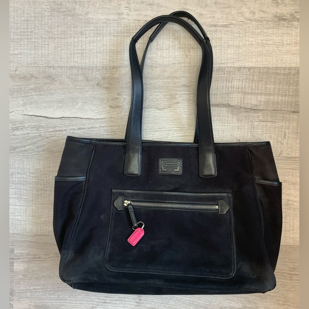 This is a vintage Coach bag, it is also authentic genuine leather!